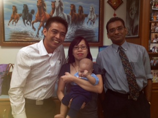 Madam Liew Chew Lee, husband and baby with Dr Somas
